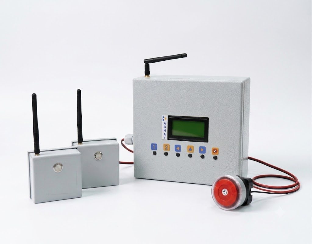 ABHAY endpoint devices and receiver panel with sounder, on a plain background